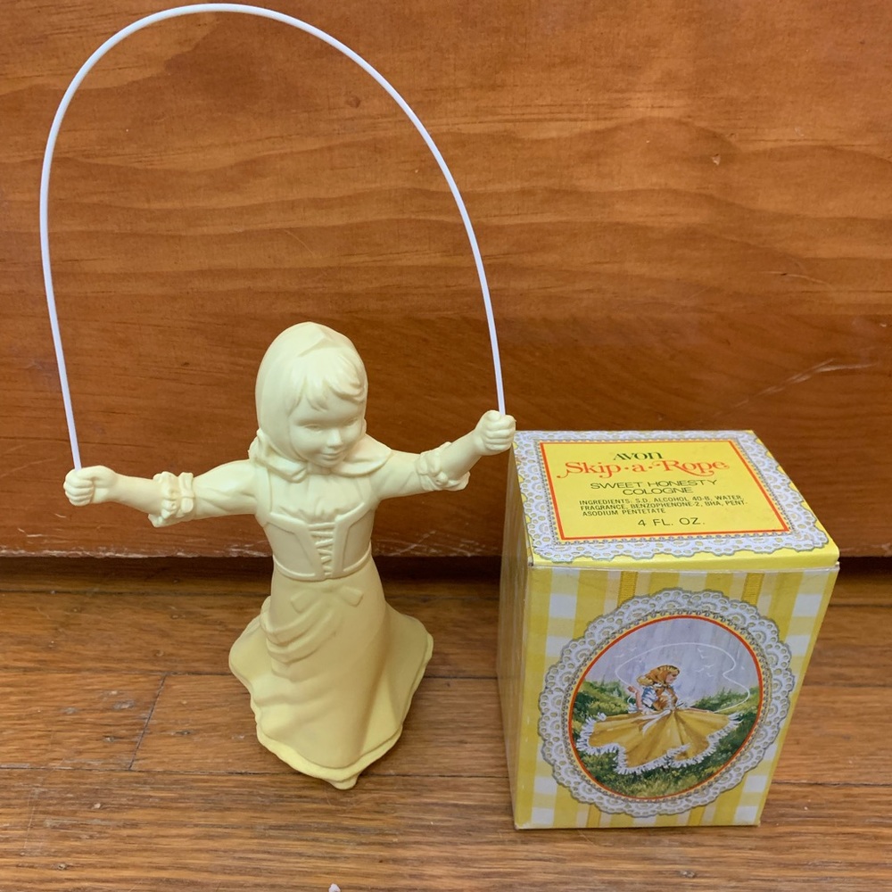 Avon Skip-A-Rope Decanter w/ Bird Of Paradise Cologne Vtg 1977 4 Fl Oz Yellow